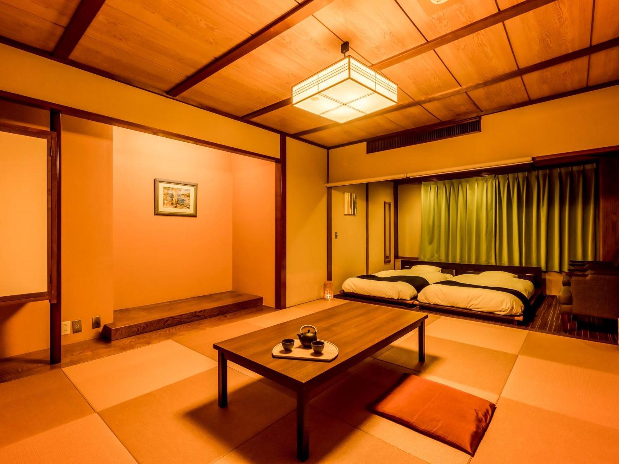 Готель Ooedo Onsen Monogatari Kaike Йонаґо Номер фото